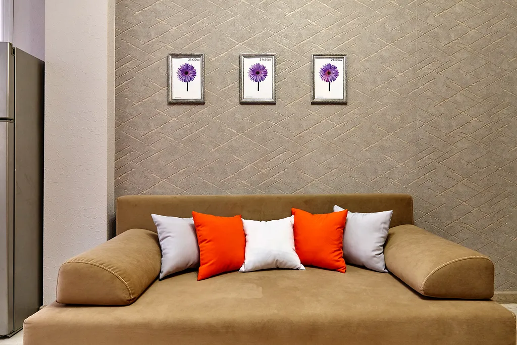 Апартаменты Оранж с диваном в кухне-гостиной