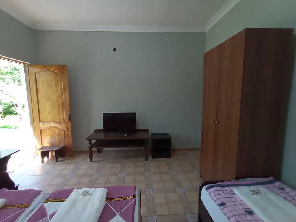 Коттедж в саду у Веры