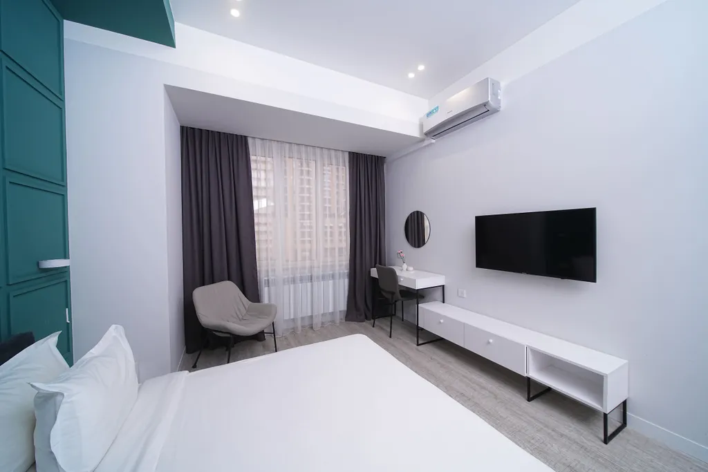 Студия с раздельными кроватями или с одной большой кроватью