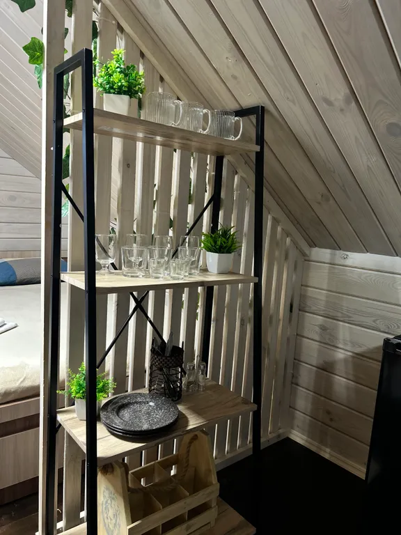 Уютный номер на крыше с террасой