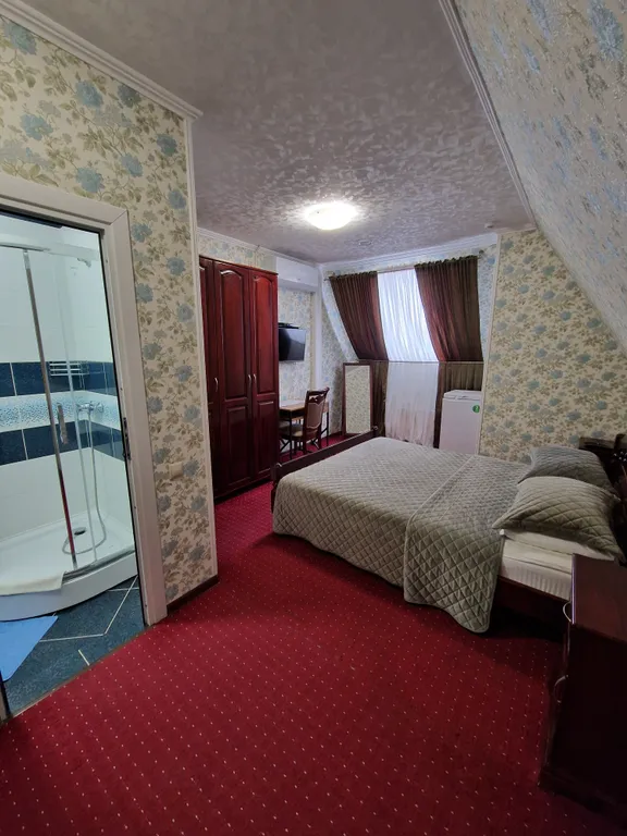 Номер с 2 спальной кроватью