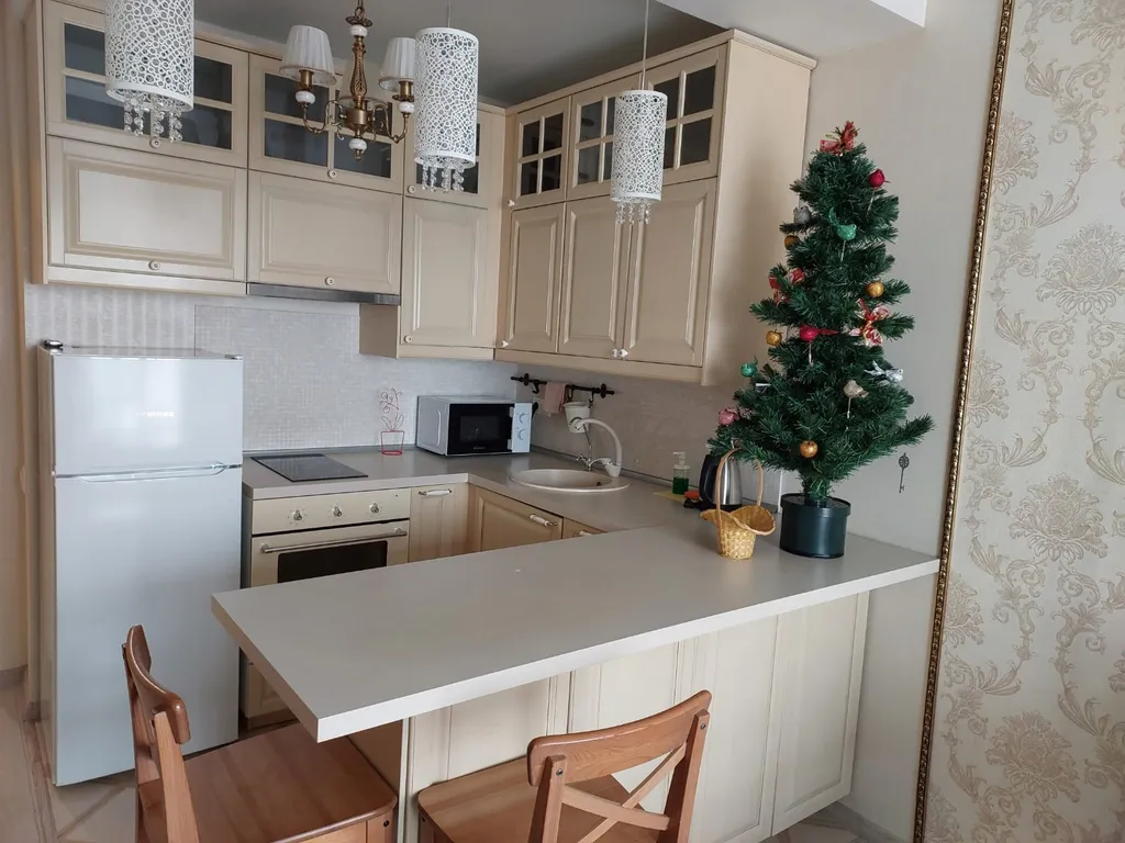 Уютная современная квартира в новом доме с красивым видом на город