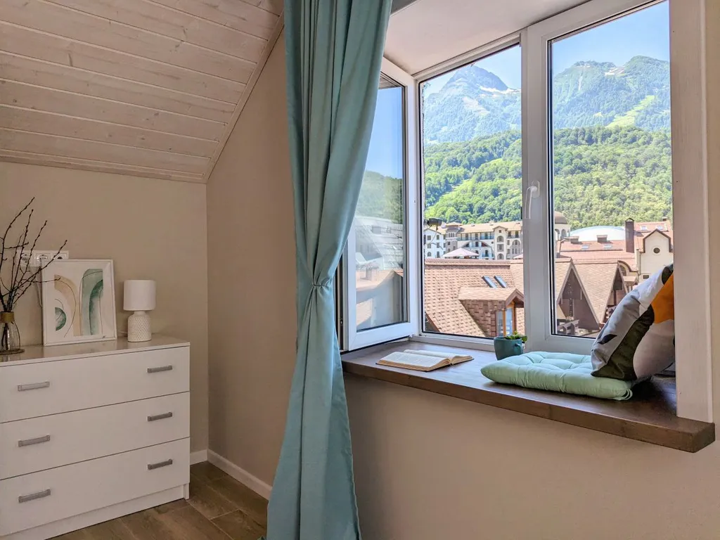 Роскошные двухуровневые апартаменты с панорамным видом на горы