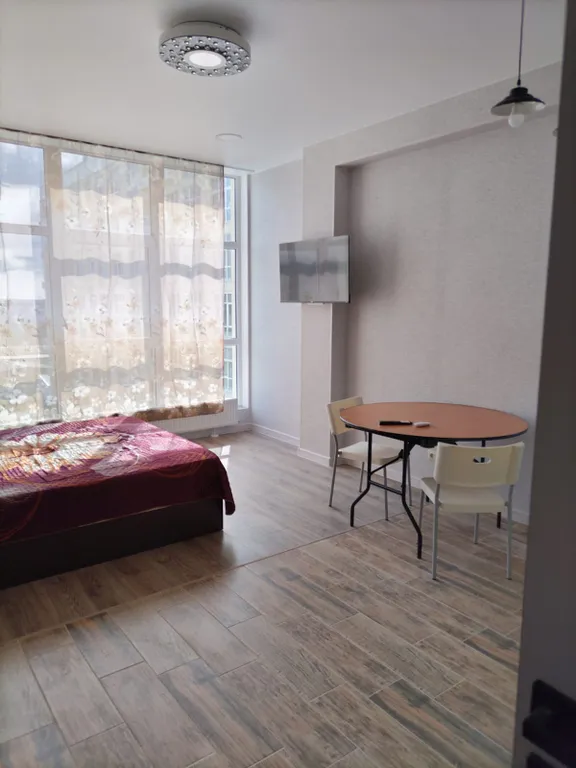 Уютная студия в центре города с видом на город