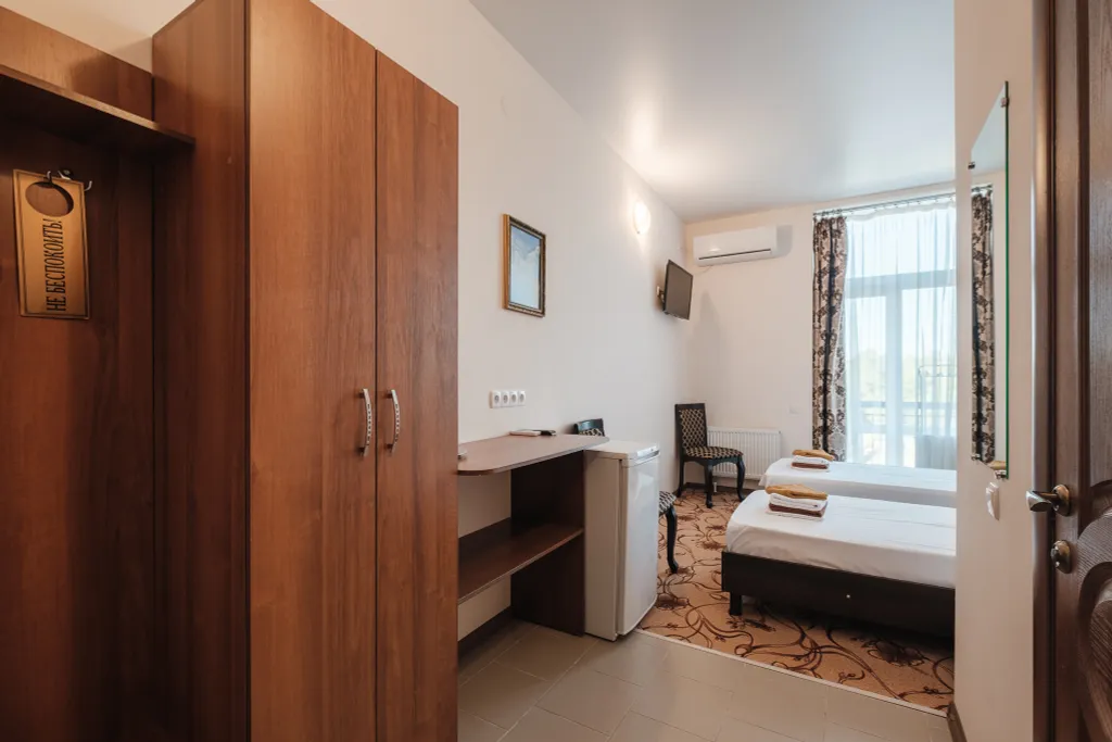 Двухместный номер категории Стандарт с раздельными кроватями