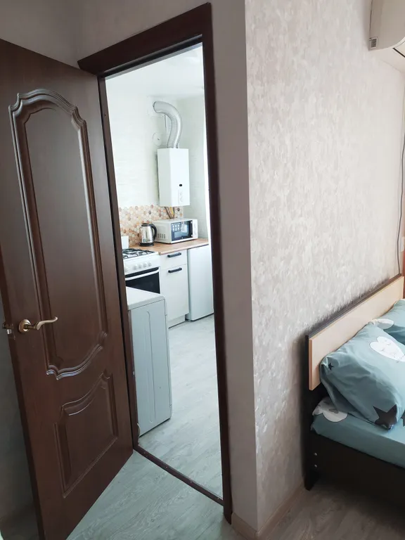 Уютная квартира (15 минут до центра на автобусе)