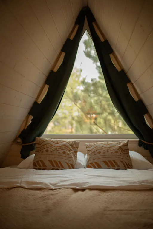 Треугольный дом