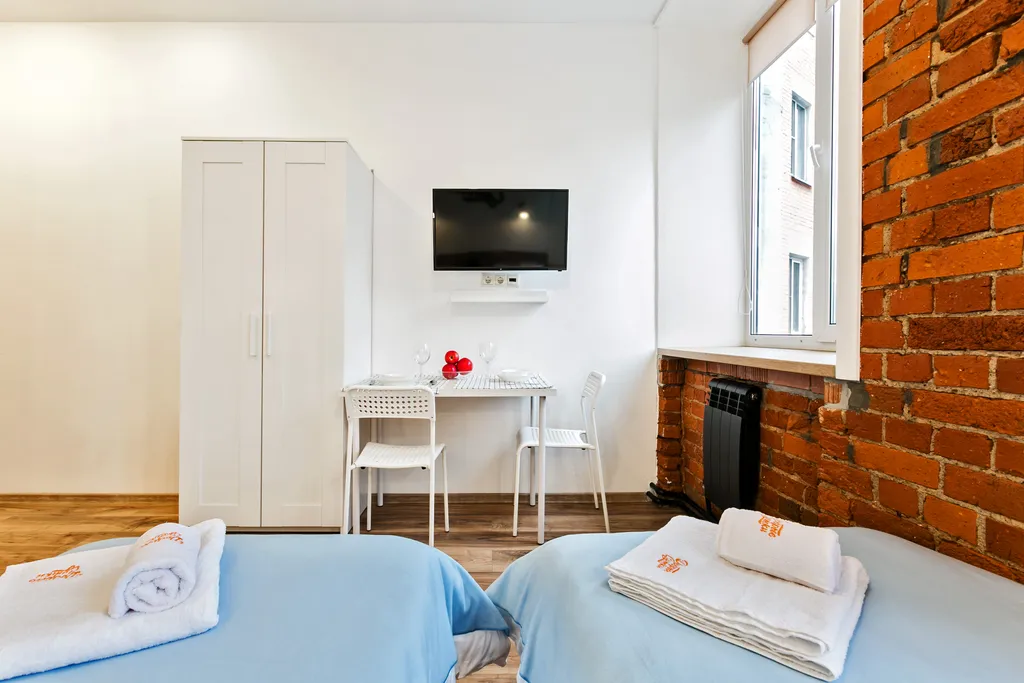 Городской оазис: стильная студия для современных людей