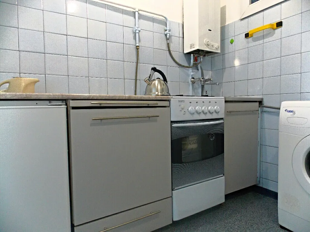 Уютная двухкомнатная квартира в центре со своим гаражем.