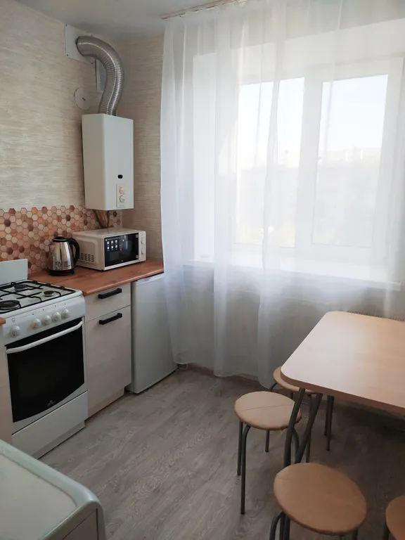 Уютная квартира (15 минут до центра на автобусе)