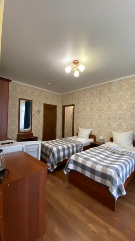 Квартира Улучшенный трехместный номер с 3 отдельными кроватями — аренда посуточно в Астрахань