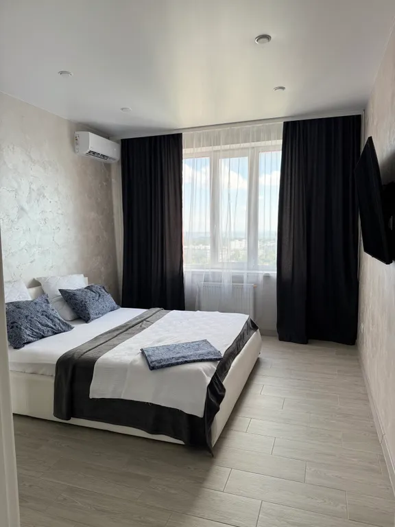 Уютная светлая квартира с видом на город