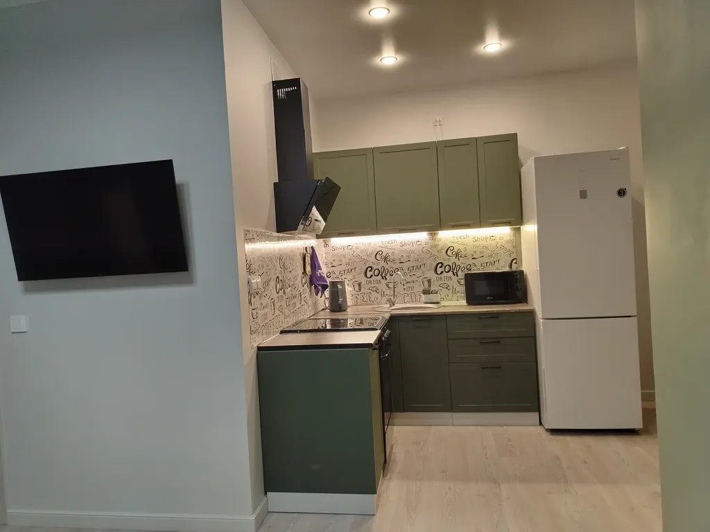 Квартира-студия с видом на город среди гор