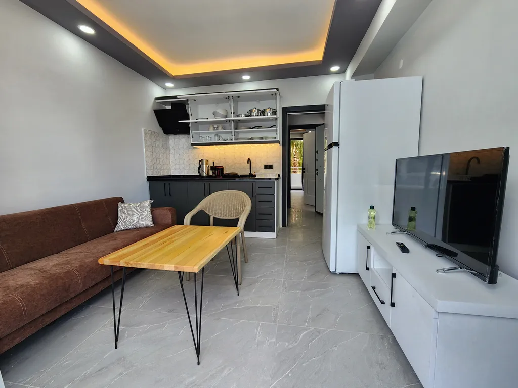 Квартира в центре Сиде внутри комплекса с бассейном