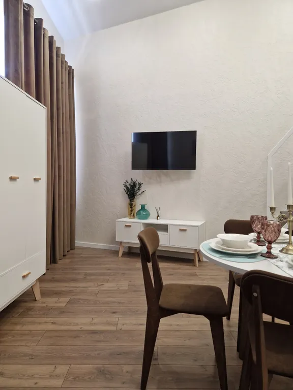 Уютная двухуровневая студия в центре