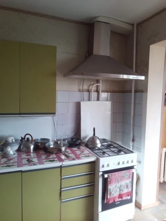 Уютная комната с видом на море и горы в центре города