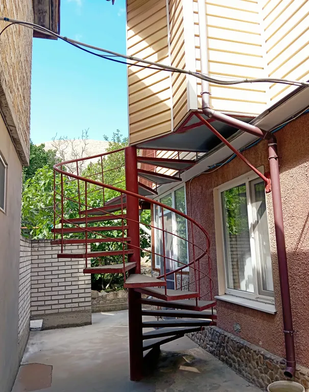 Деревянная мансарда с балконом