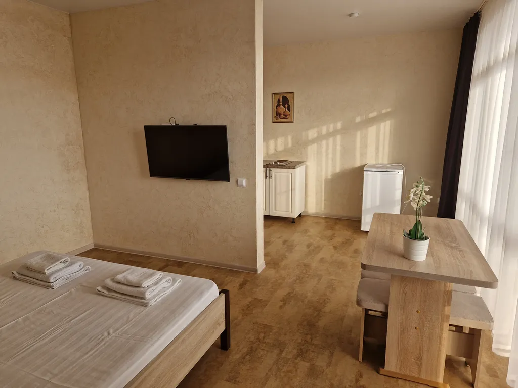 Комфортабельный номер с балконом-террасой и кухней