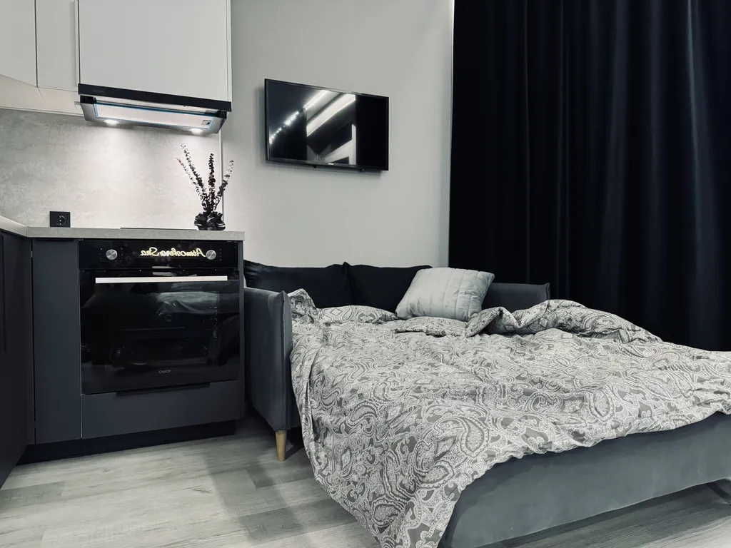 Изящная студия с шикарным видом на мегаполис