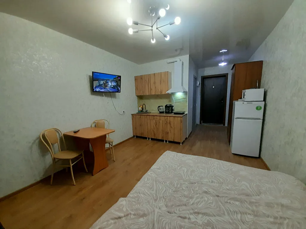 Коричневая студия в центре