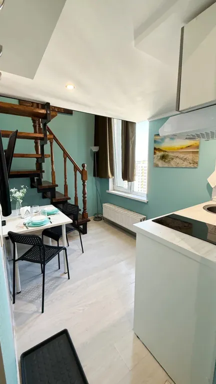 Стильная двухуровневая студия