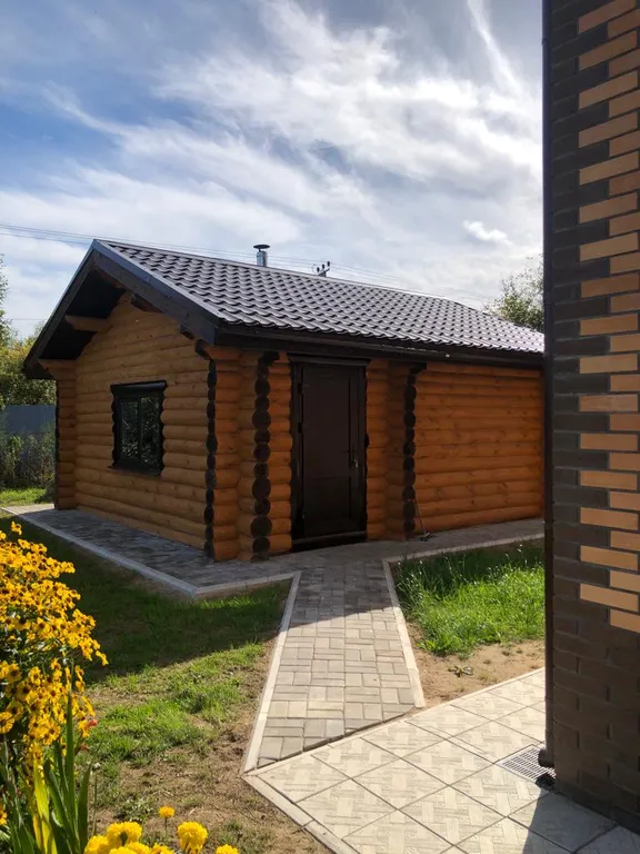 Современный дом из бревна