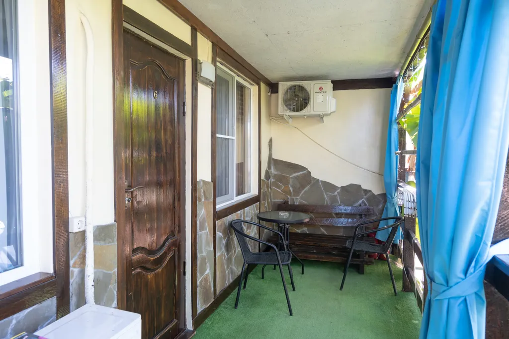 Квартира Квартира Четырёхместный номер с двухспальной кроватью и двухспальным диваном — Сухум