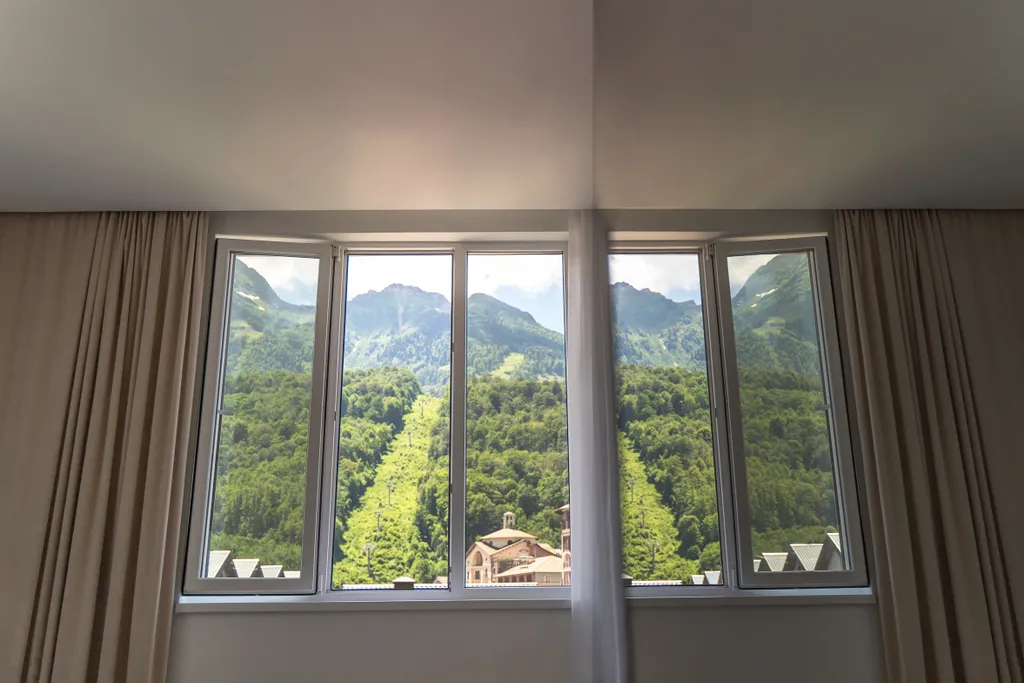 Семейный номер с видом на горы и кухонной зоной