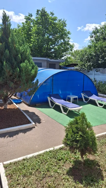 Дом-шалаш на территории частного домовладения