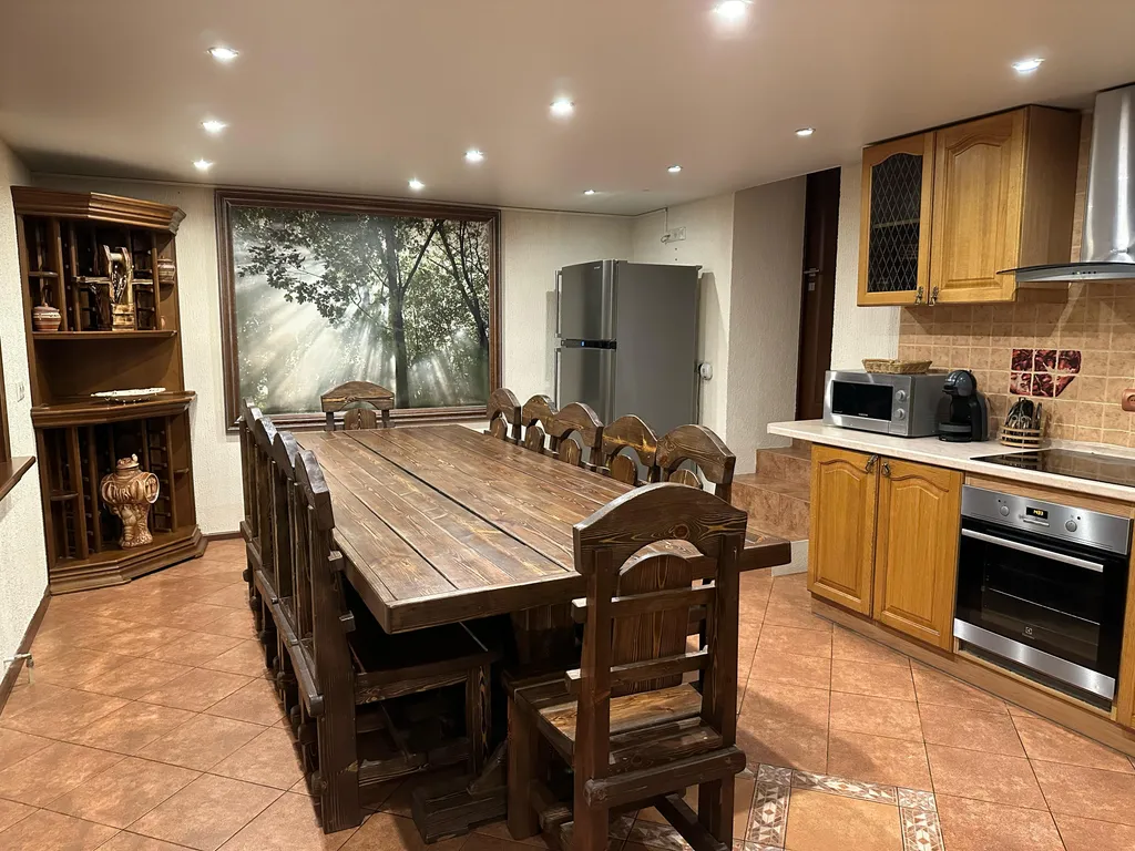 Дом на берегу реки с баней на дровах