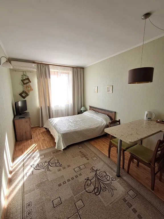 Уютный номер-студия со всеми удобствами в центре