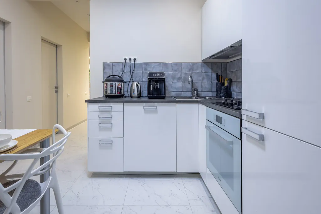 Квартира MyHomeYourHome в клубном доме с бассейном