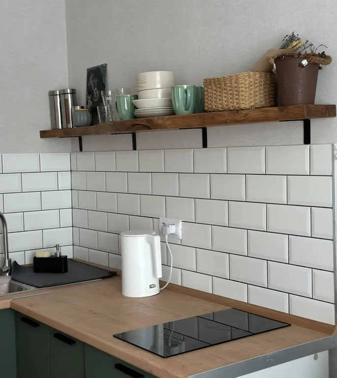 Солнечная квартира в центре города с видом на гору