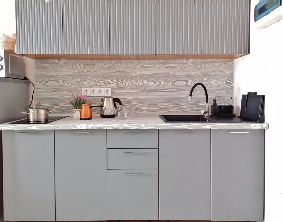 Комфортный семейный номер-студия с видом на горы