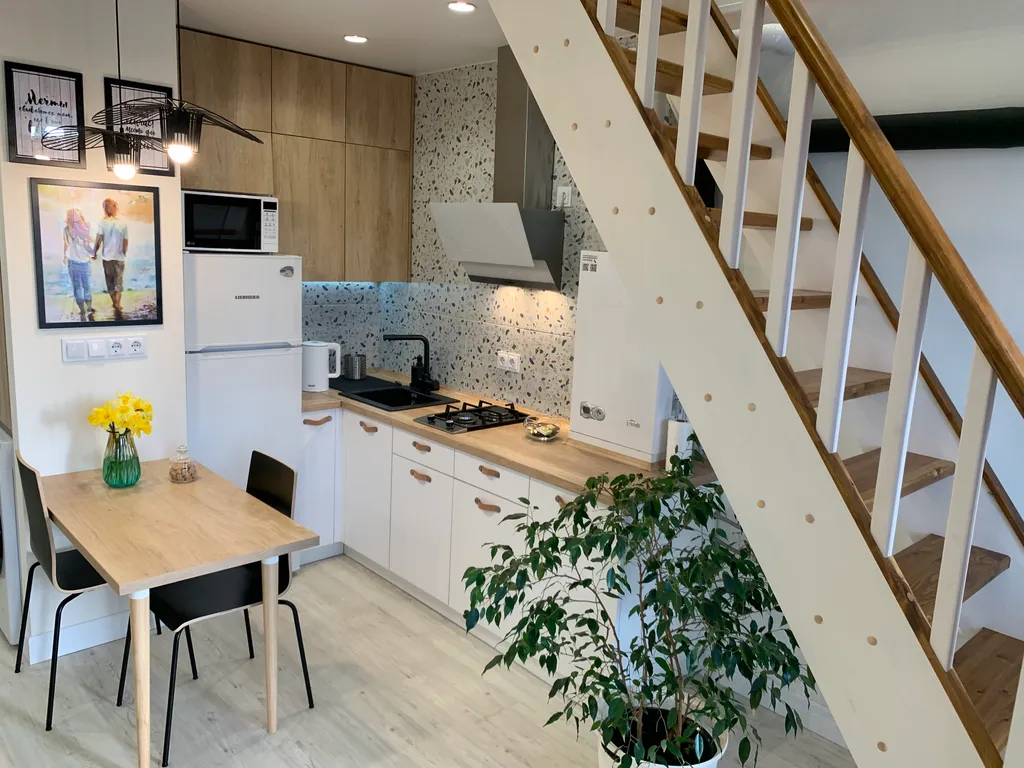 Двухуровневые апартаменты Снегурочка на набережной в центре города