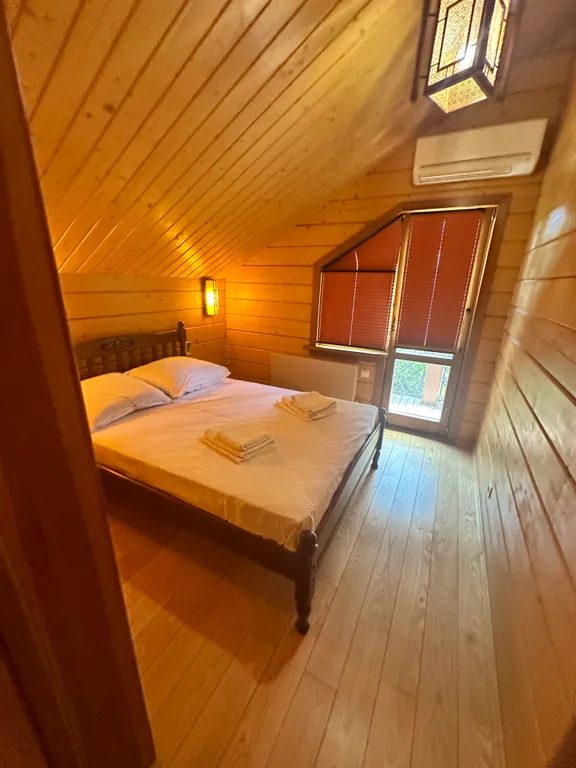 Деревянный дом с приватной территорией