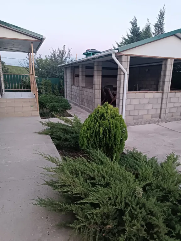 Уютный дом в живописном поселке у моря