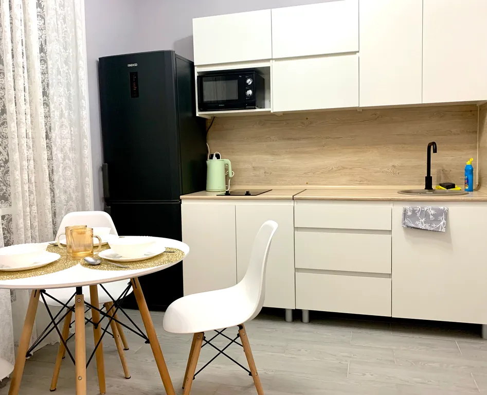 Современная квартира в новом жилом комплексе рядом с въездом в город