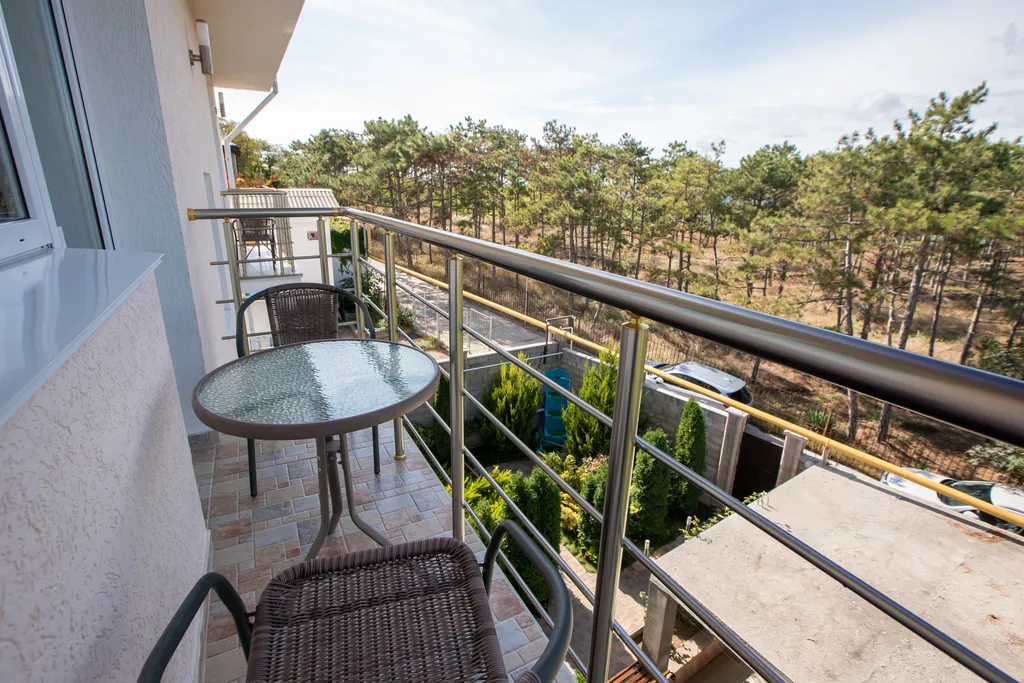 Четырёхместная комната-комфорт с балконом