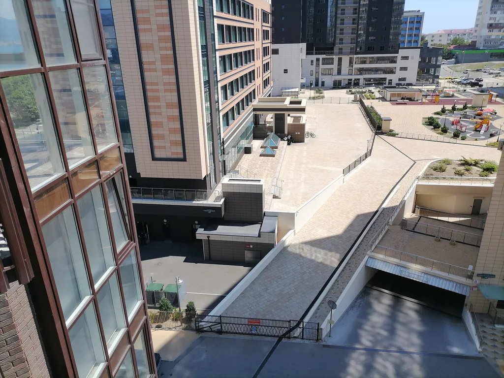 Резиденция на первой линии около Хилтона