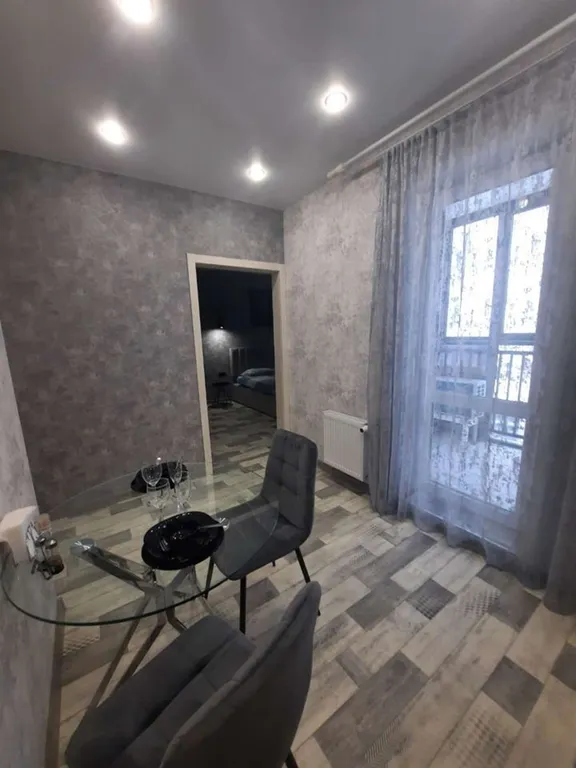 Уютная студия с видом на город