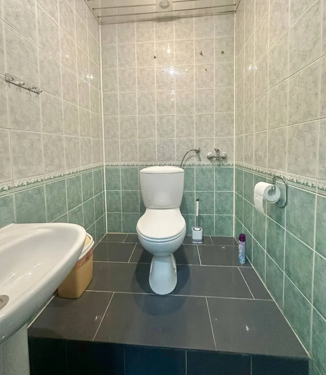 Бюджетная комната для 3 человек, вид на крыши, самый центр