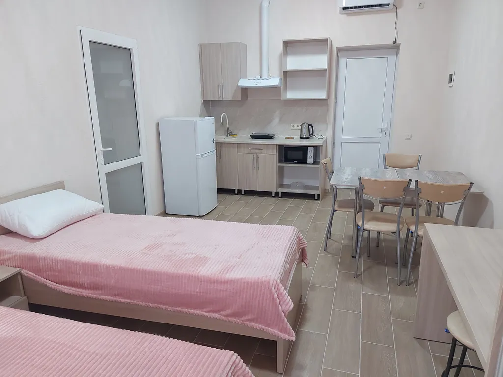 Семейный номер с кухней- гостинной и отдельной спальней