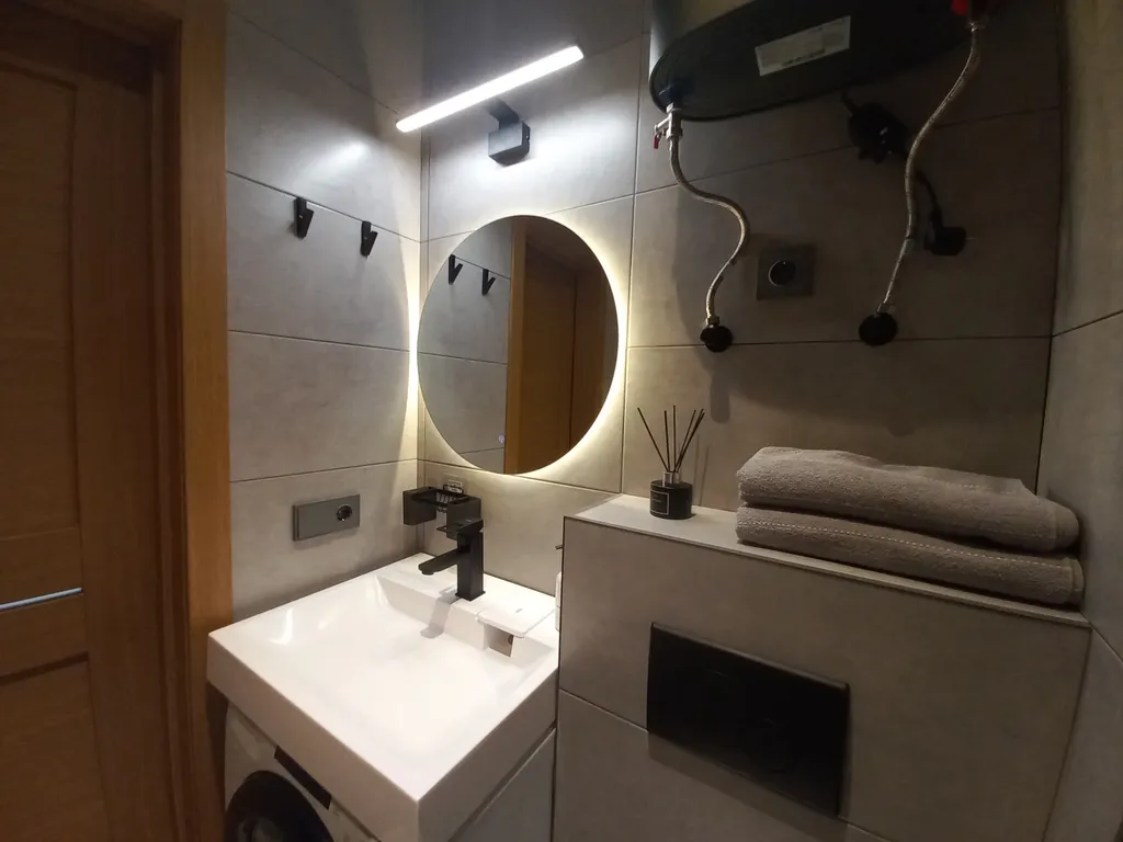 Уютная квартира с новым ремонтом в центре поселка