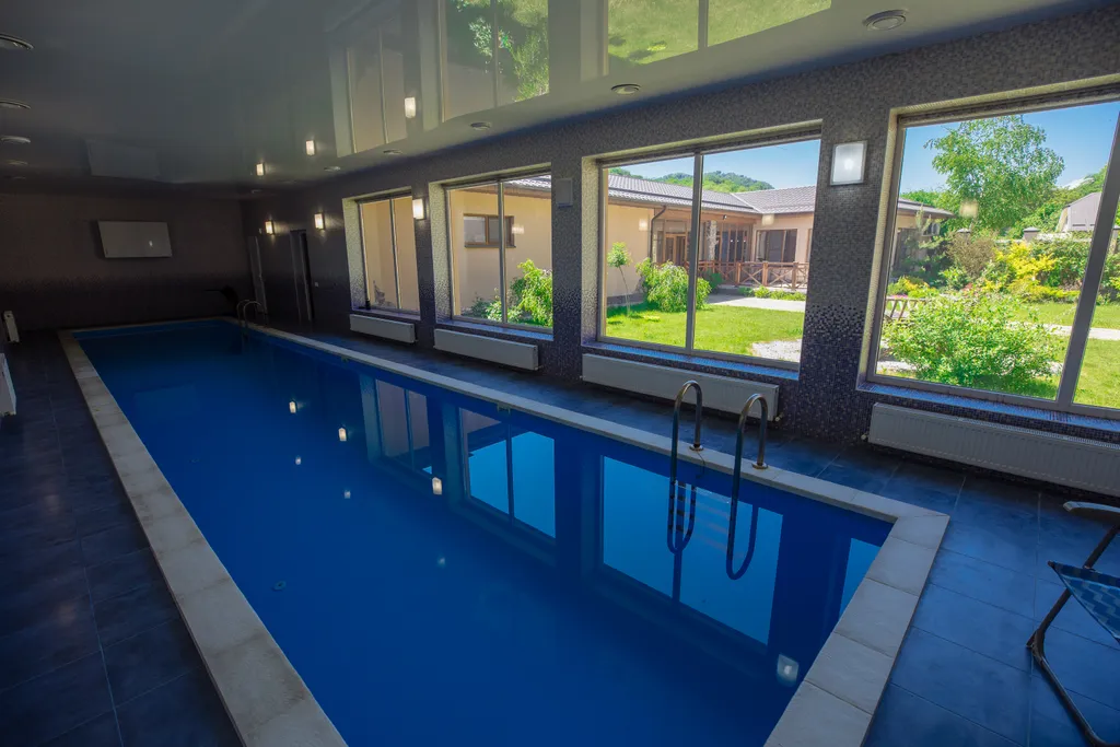 Загородный дом с бассейном и зоной отдыха