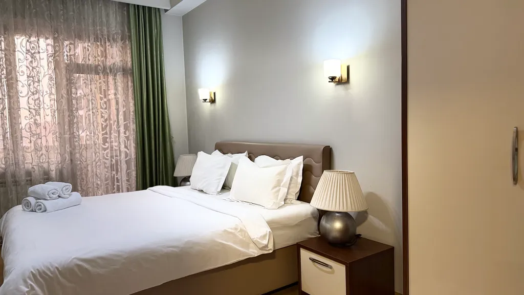 Улучшенные апартаменты с 1 спальней и  балконом в центре города