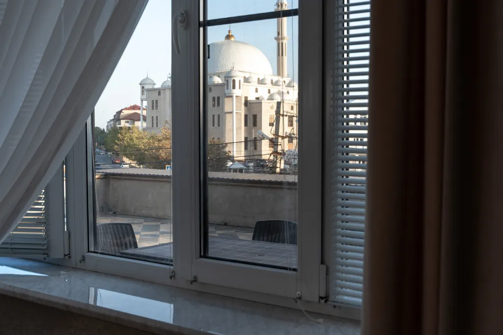 Апартаменты с видом на достопримечательность большую белую Месеть