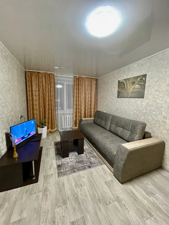 Уютная квартира в центре города с красивым видом города из окна