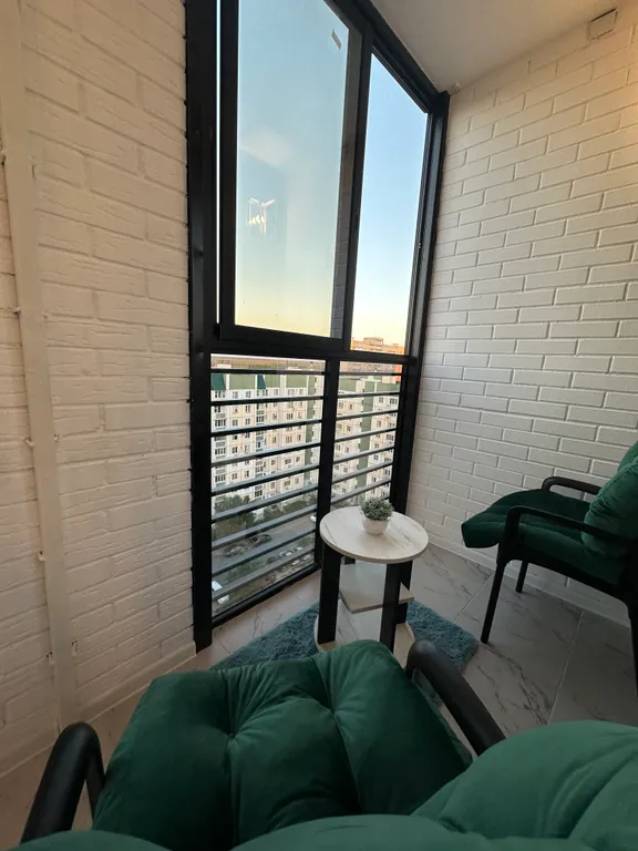 Студия с панорамным балконом