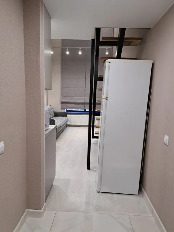 Стильная и уютная двухъярусная студия